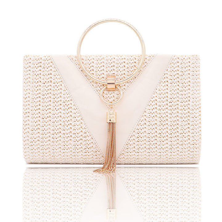 Woven handbag with gold ring handle and tassel detail - Bopi