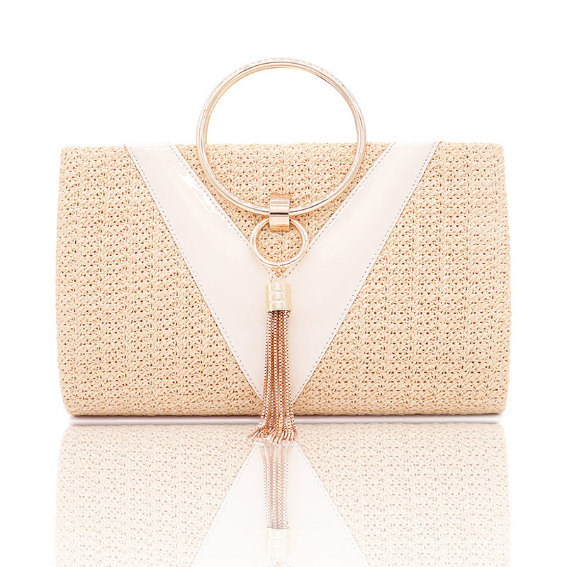Woven handbag with gold ring handle and tassel detail - Bopi