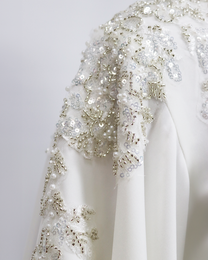 Sequinned shoulders dress with floor-length sleeves