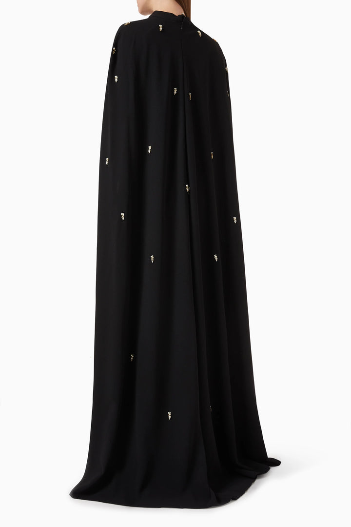 embellished cape gown with crystal accents – THRIIYE