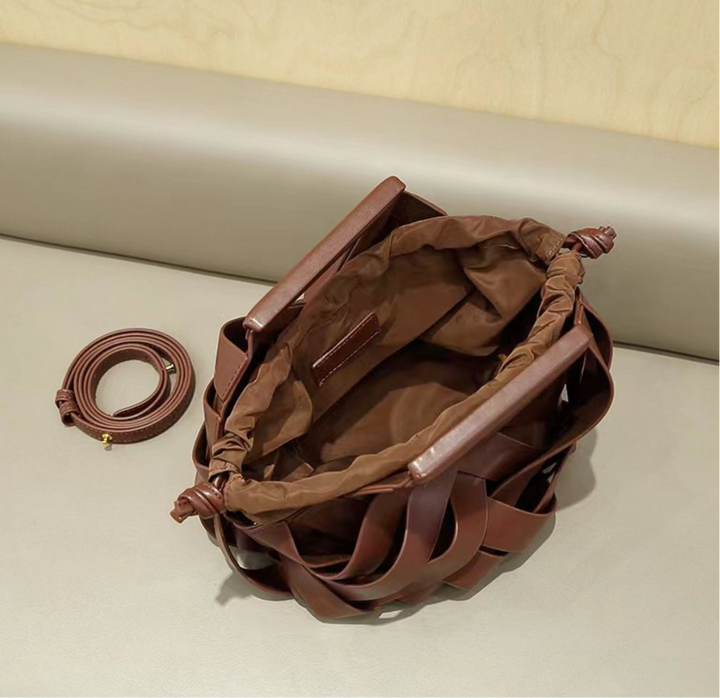 woven leather triangle-handle crossbody bag - Ahrana