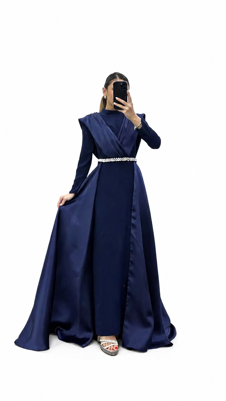 A long dress with flowing embroidery and a crystal-studded waist belt - JILAA