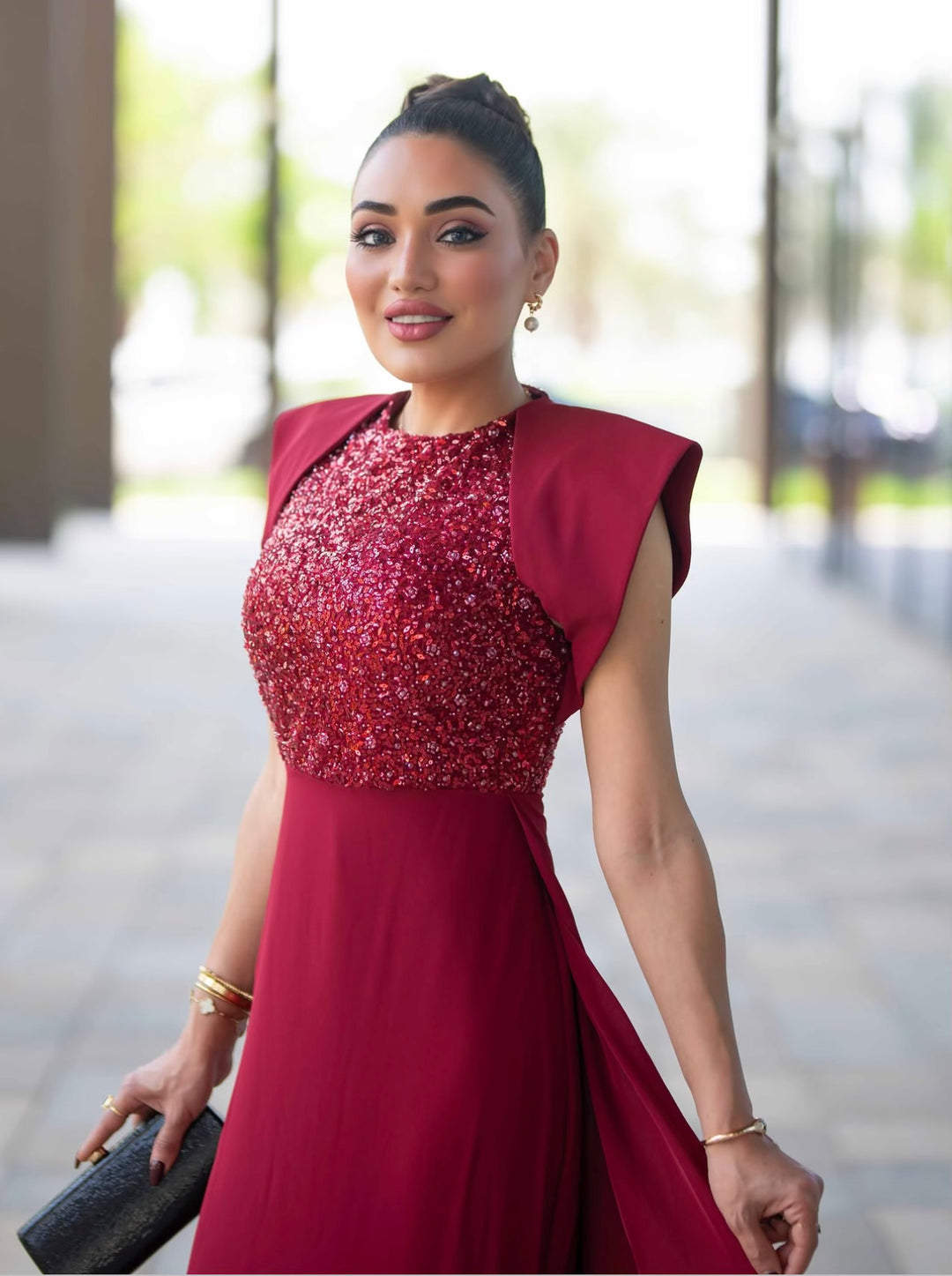 sleeveless gown with sequined bodice and structured cape shoulders – RELYE