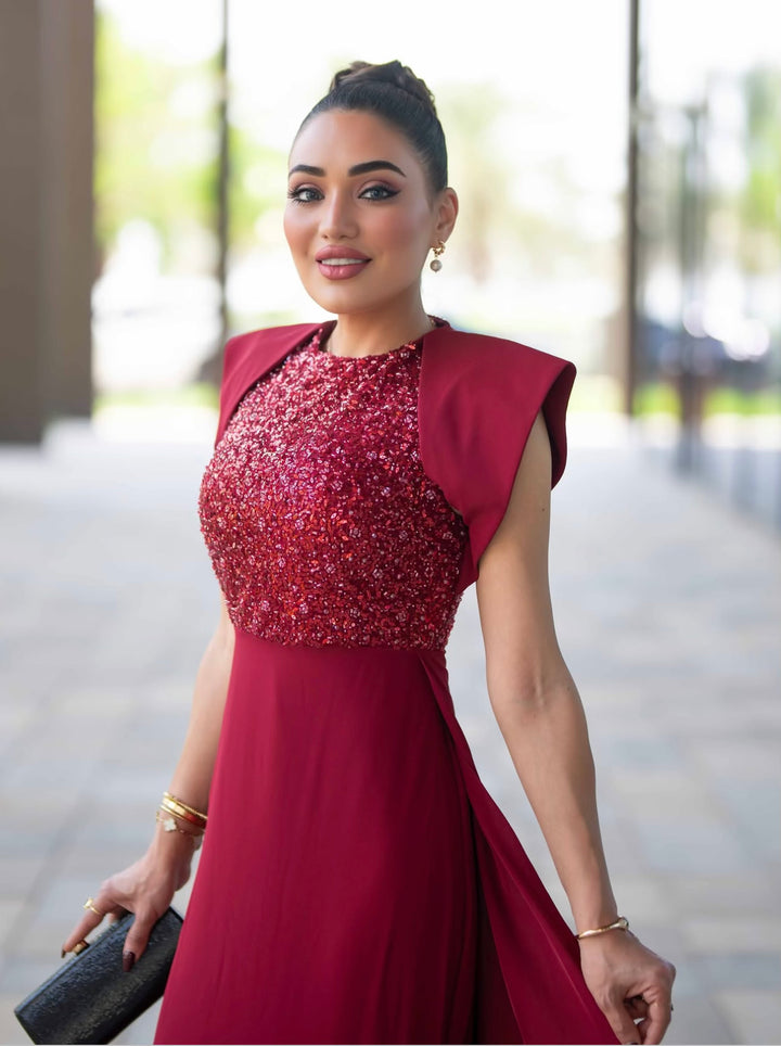 sleeveless gown with sequined bodice and structured cape shoulders – RELYE