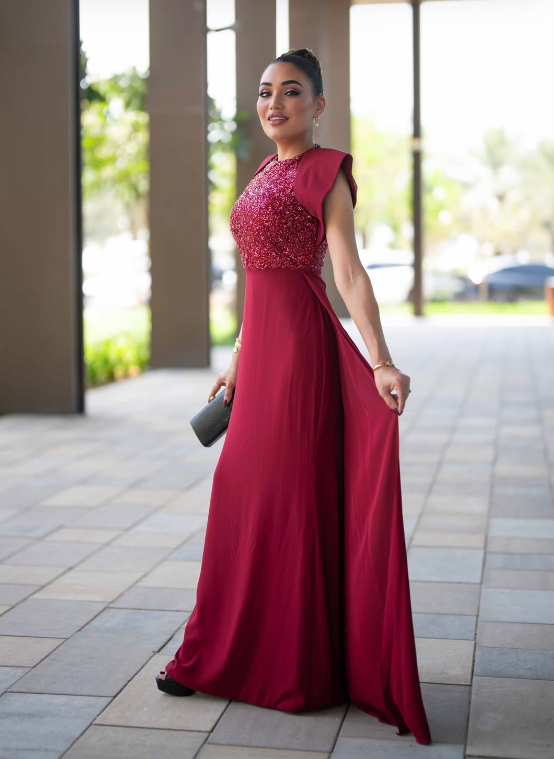 sleeveless gown with sequined bodice and structured cape shoulders – RELYE