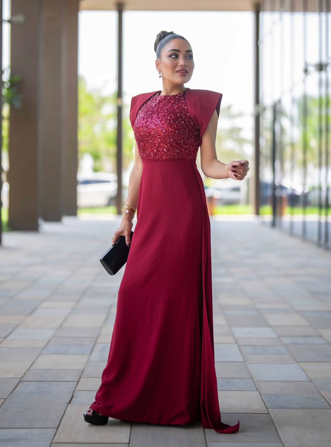 sleeveless gown with sequined bodice and structured cape shoulders – RELYE