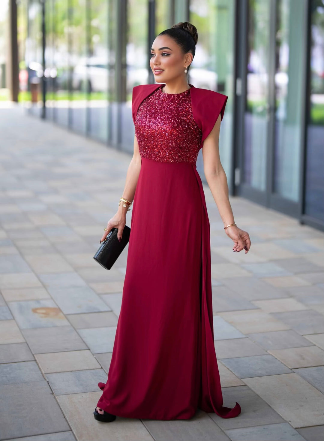 sleeveless gown with sequined bodice and structured cape shoulders – RELYE