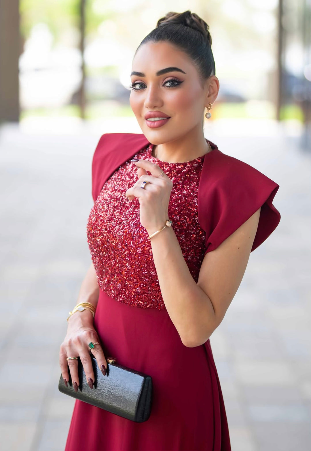 sleeveless gown with sequined bodice and structured cape shoulders – RELYE