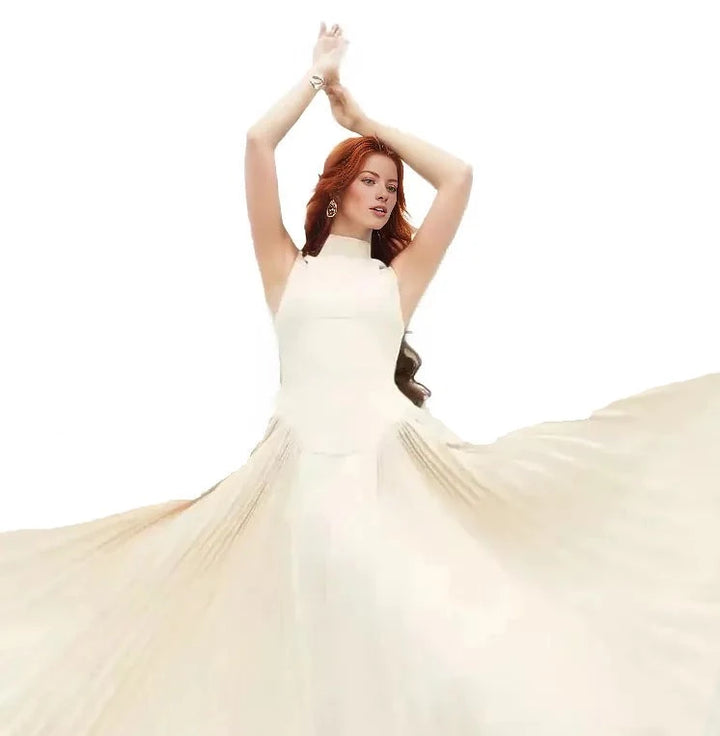 Sleeveless high-neck midi dress with pleated skirt – Jolian