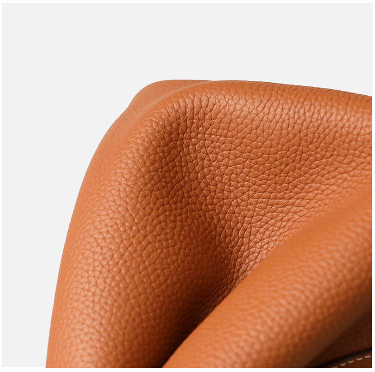 textured leather tote bag with lock detail – AURA