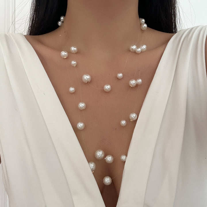 floating pearl strand necklace with layered illusion threads – AUIRO
