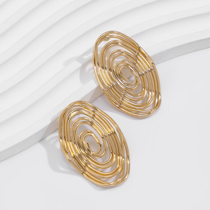 Spiral wire oval earrings in metallic finish - Noliz