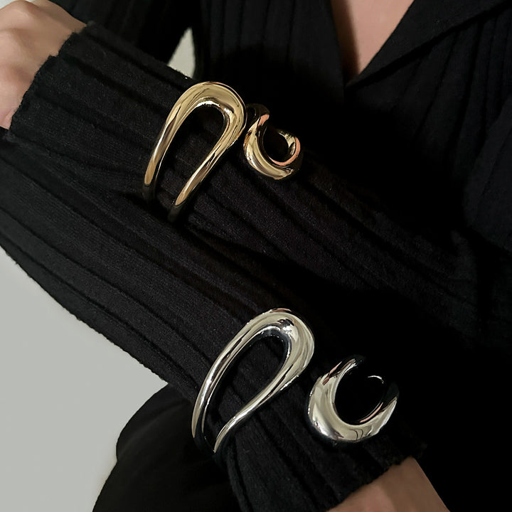Abstract wave-shaped open cuff bracelet with polished finish – Akjy