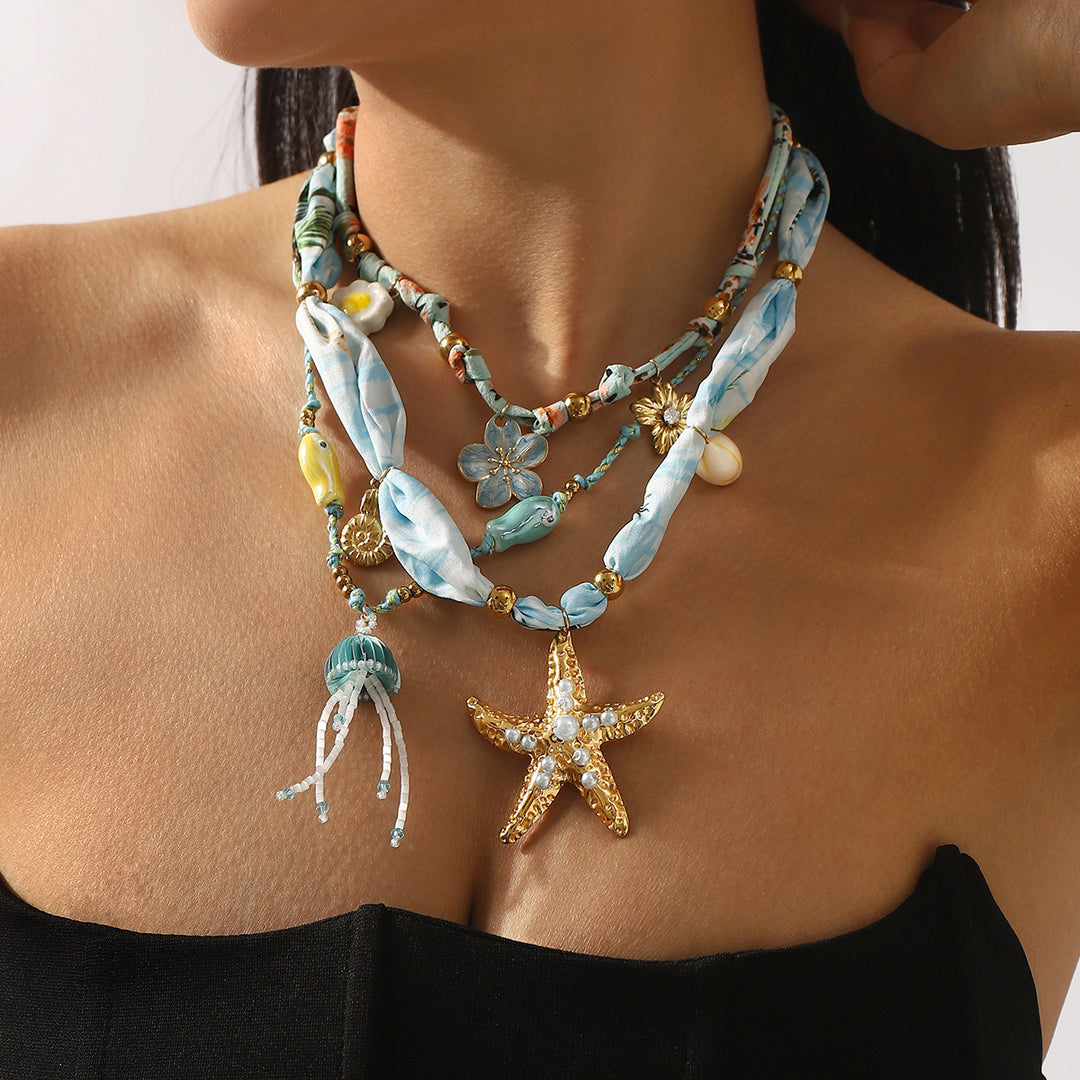 قلادة ساحرة مع لمسات من الحرير والخرز – كوراليب