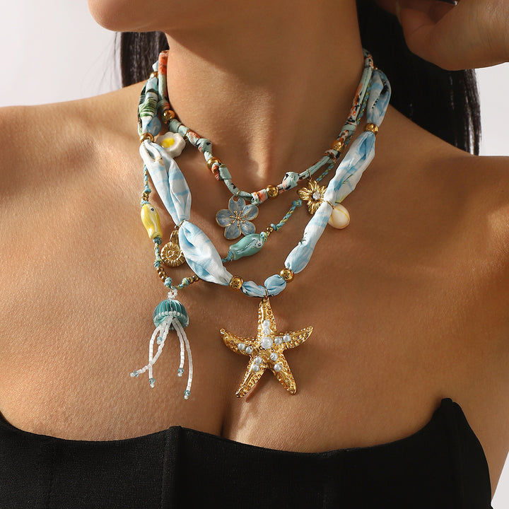 قلادة ساحرة مع لمسات من الحرير والخرز – كوراليب