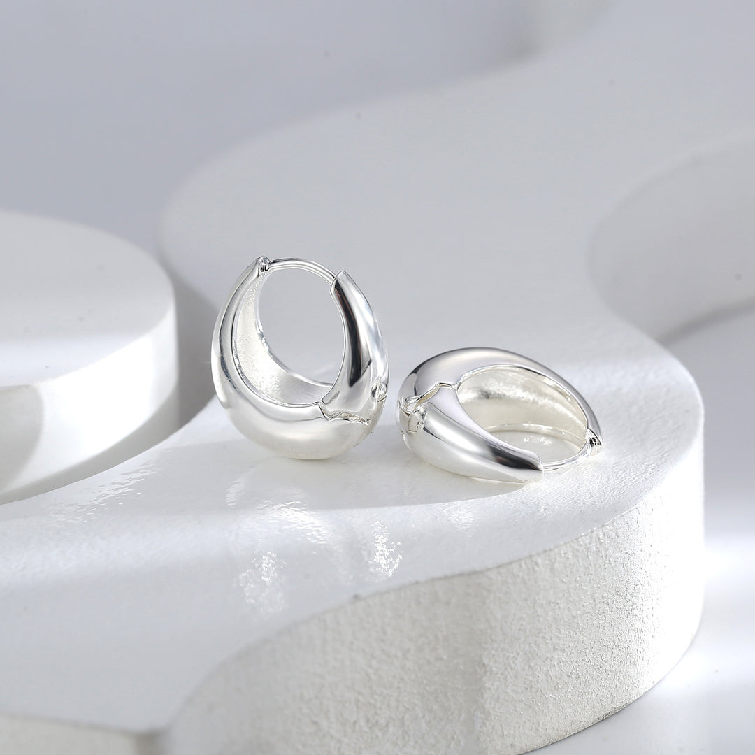 Boucles d'oreilles en forme de goutte en or et argent poli - Awama 