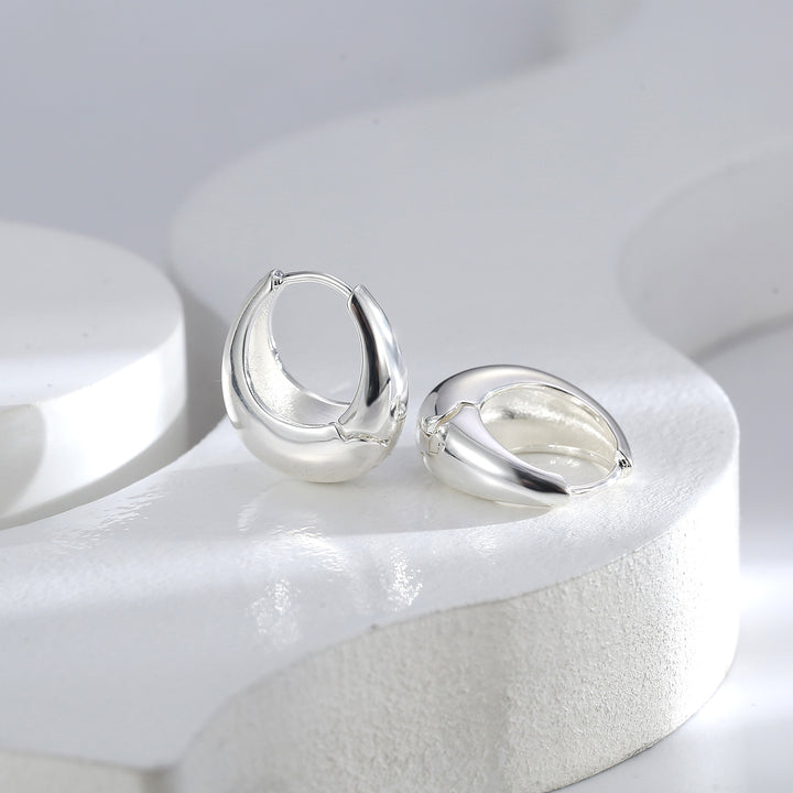 Boucles d'oreilles en forme de goutte en or et argent poli - Awama 