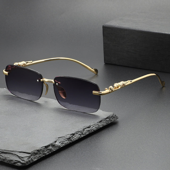 rectangular rimless sunglasses with gold panther arms – NOMR