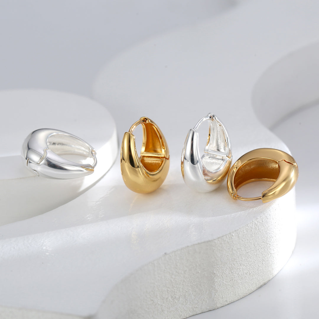 Boucles d'oreilles en forme de goutte en or et argent poli - Awama 