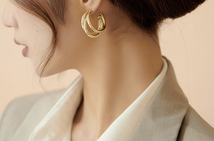 Triple hoop drop earrings in polished gold-tone finish - Arma