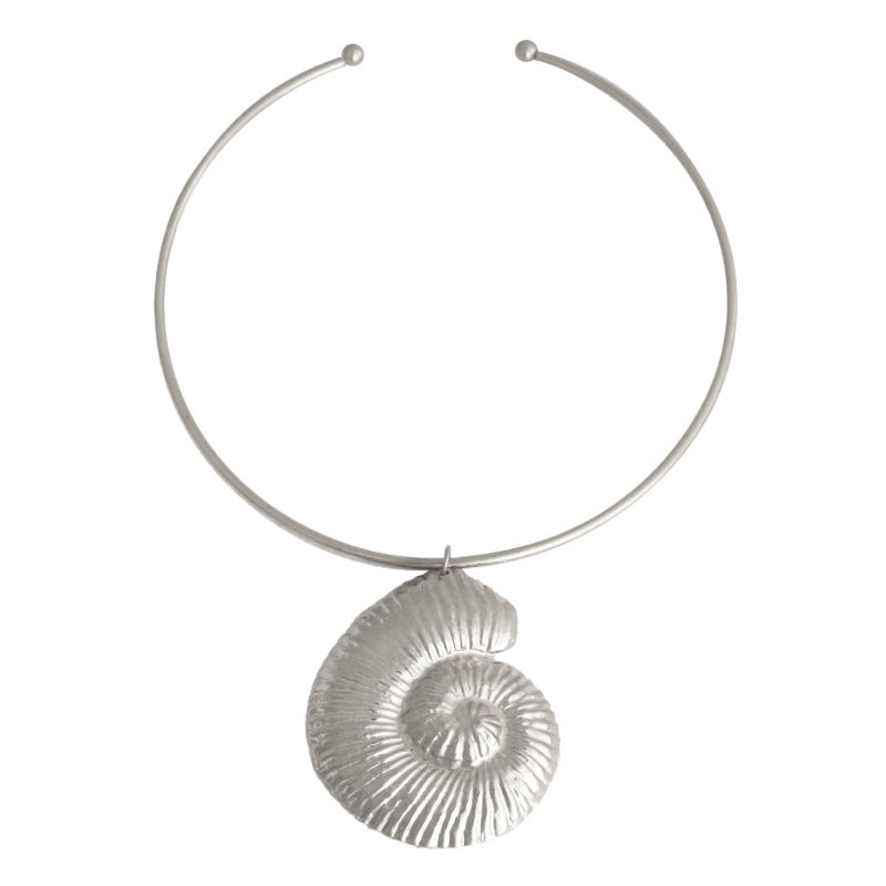 shell pendant torque necklace with textured spiral charm – LILITH