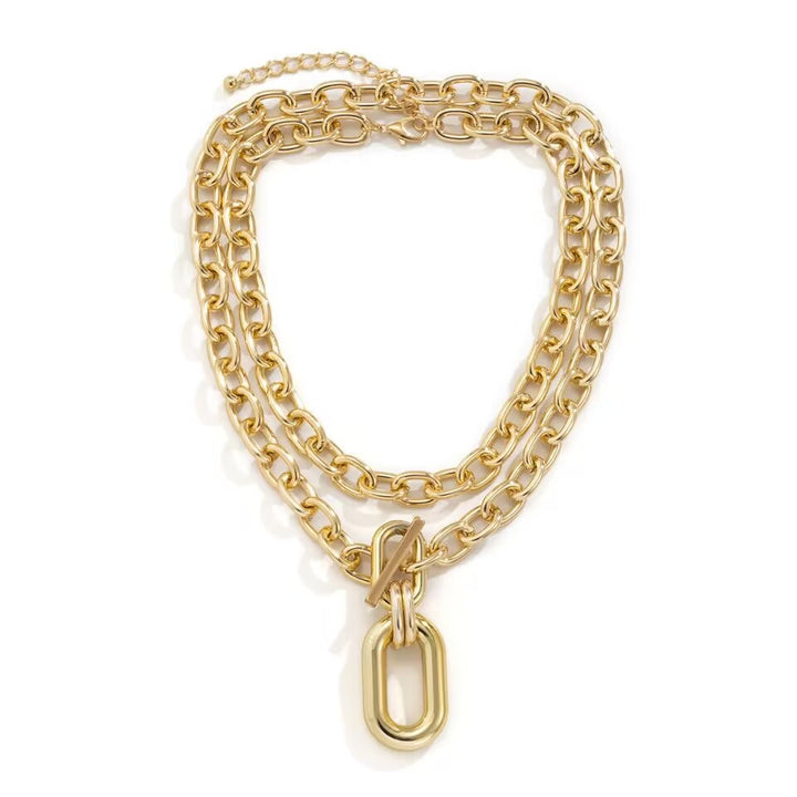 Chunky layered chain necklace with oversized pendant link - Netra