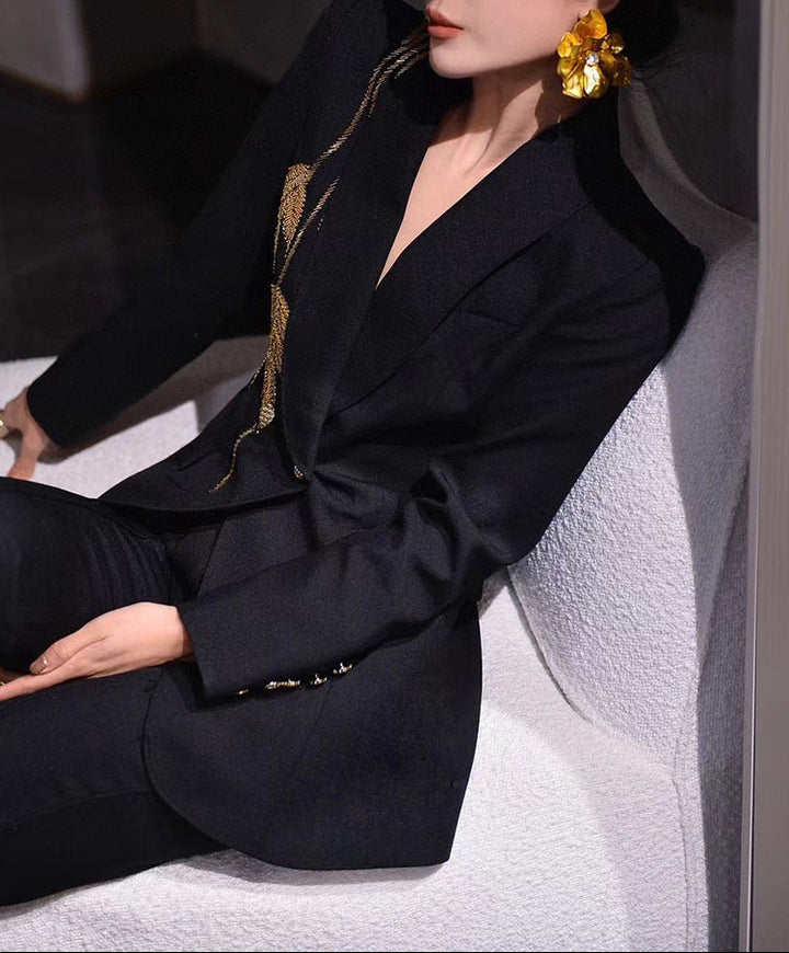 tailored flare pantsuit with structured peak lapels – AURORA