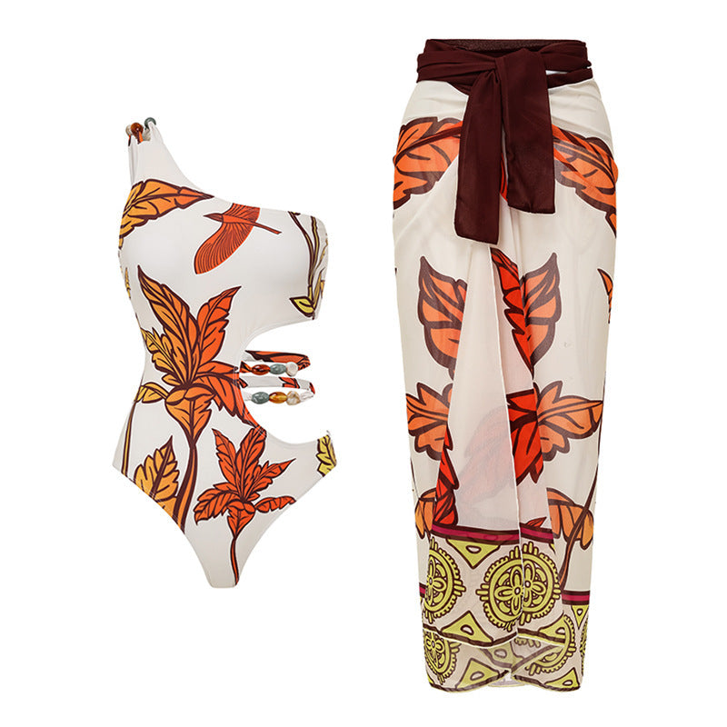one-shoulder cut-out swimsuit with wrap sarong skirt set – AMBER