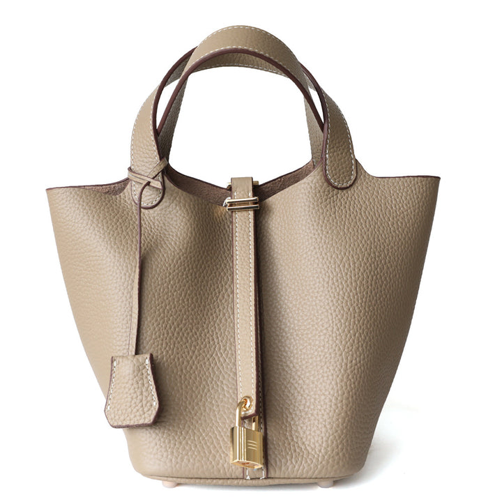 textured leather tote bag with lock detail – AURA