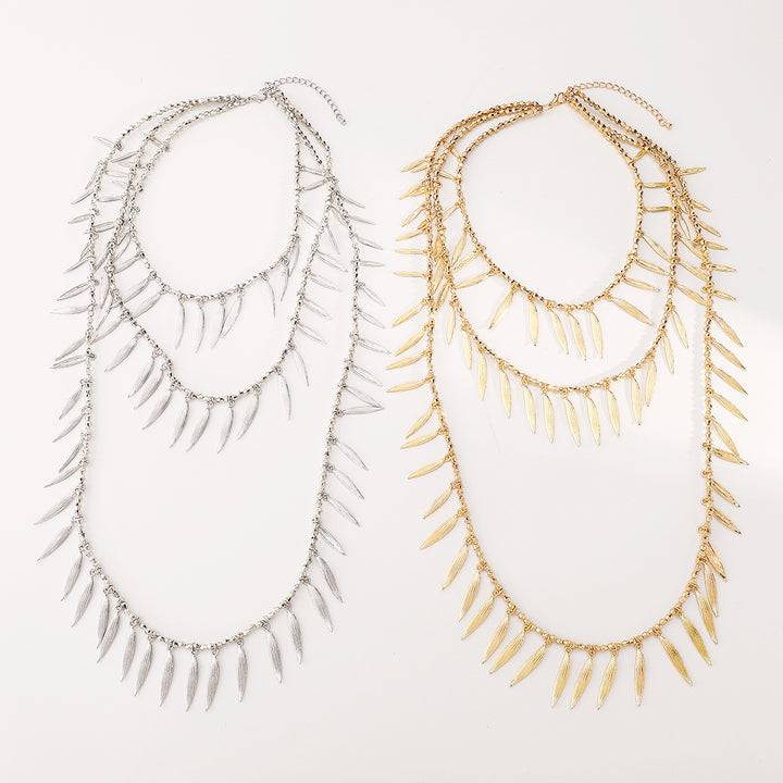 layered leaf pendant necklace with metallic finish – SERENAT