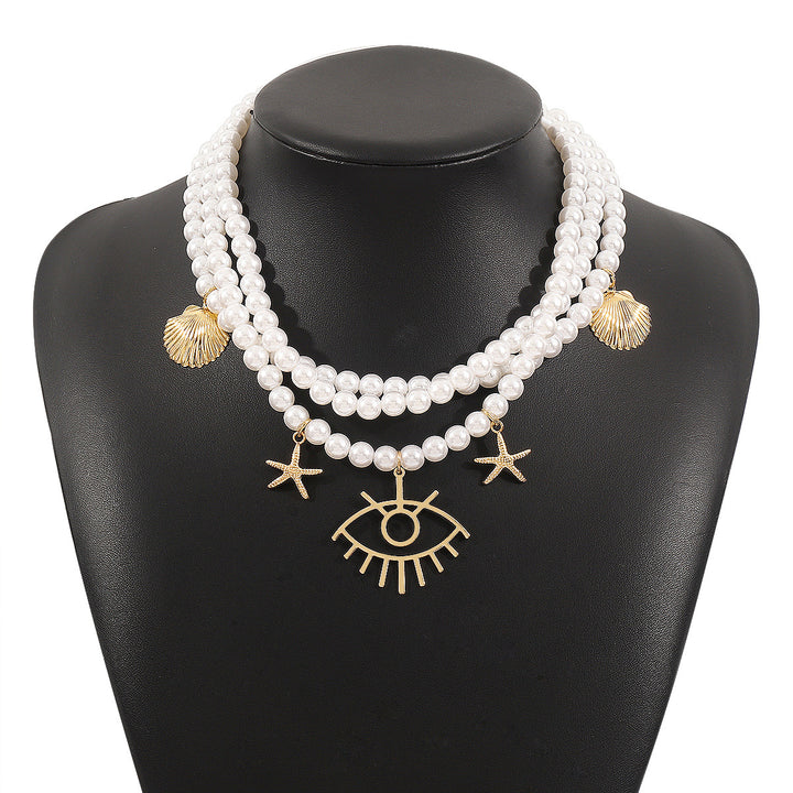 layered pearl necklace with sea charms & statement pendant - SIRENARI