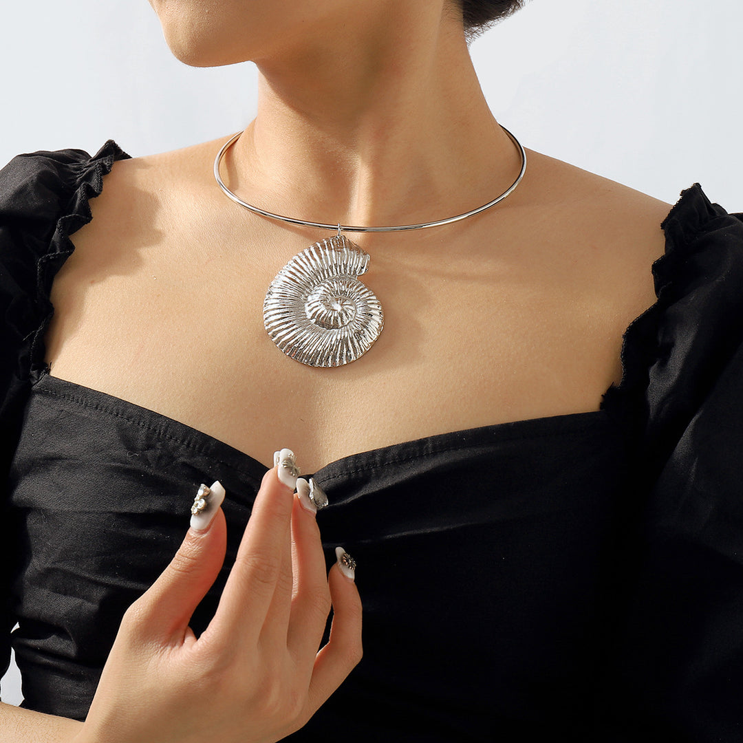 shell pendant torque necklace with textured spiral charm – LILITH