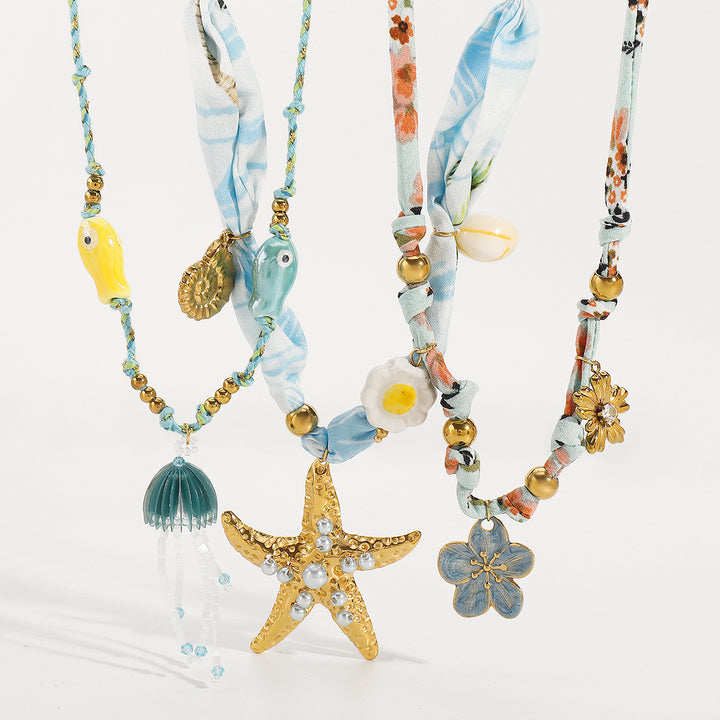 قلادة ساحرة مع لمسات من الحرير والخرز – كوراليب