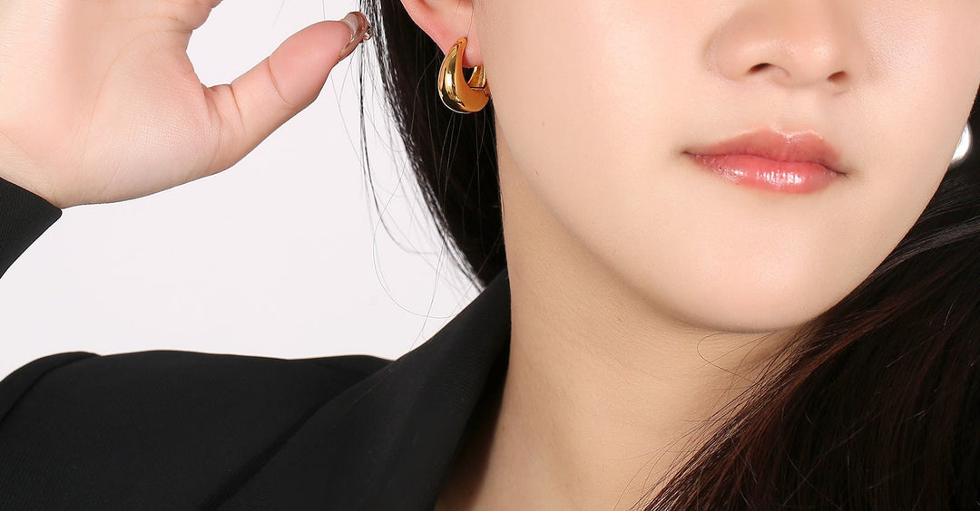 Boucles d'oreilles en forme de goutte en or et argent poli - Awama 