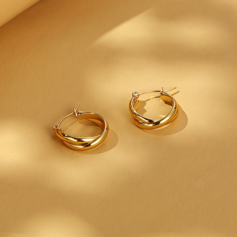 Double-layered gold hoop earrings with polished finish - Amsol