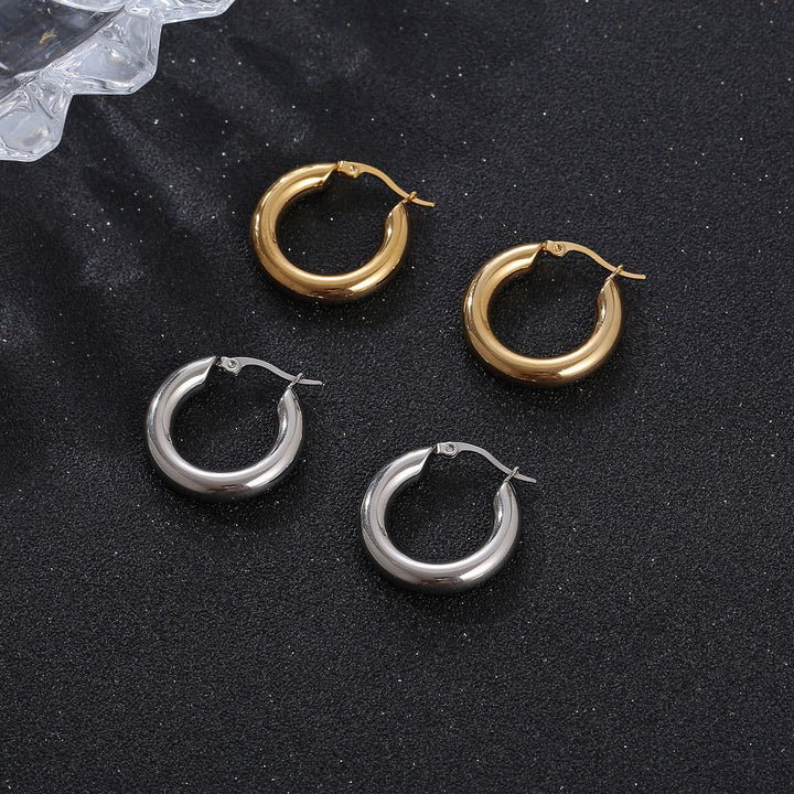Chunky hoop earrings with high-shine finish – Nolma