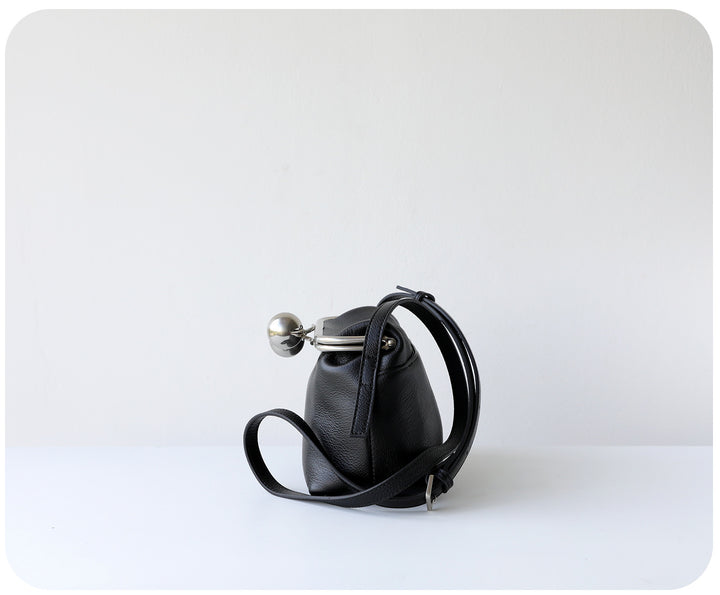 mini leather crossbody bag with metal frame clasp – YOUSF
