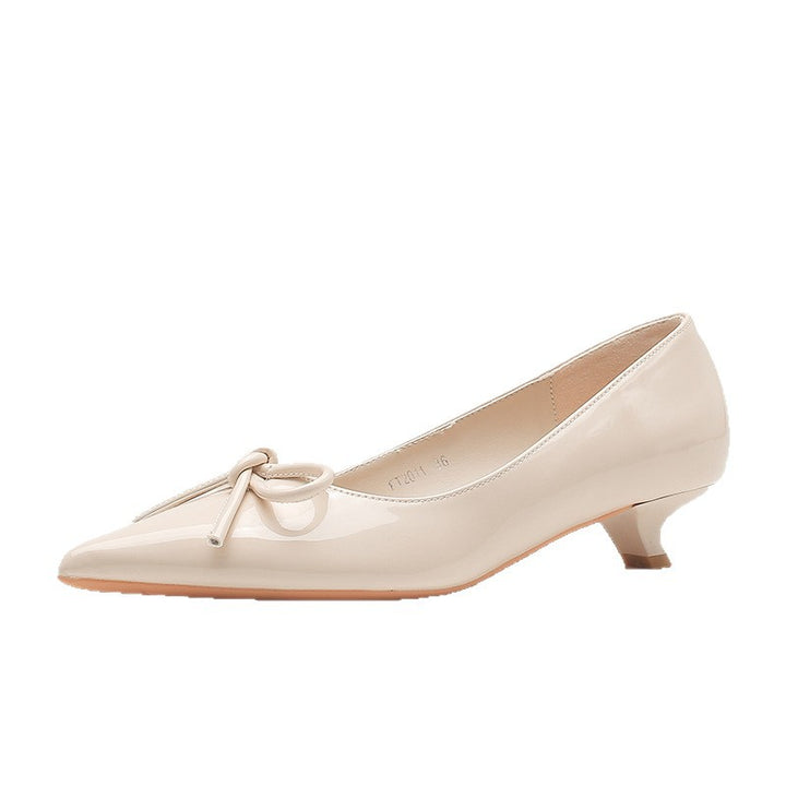 patent pointed-toe pumps with bow detail - AURADLY