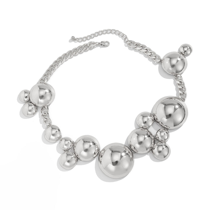 Ohrringe mit zweilagiger Textur und graviertem Detail – Akoma 