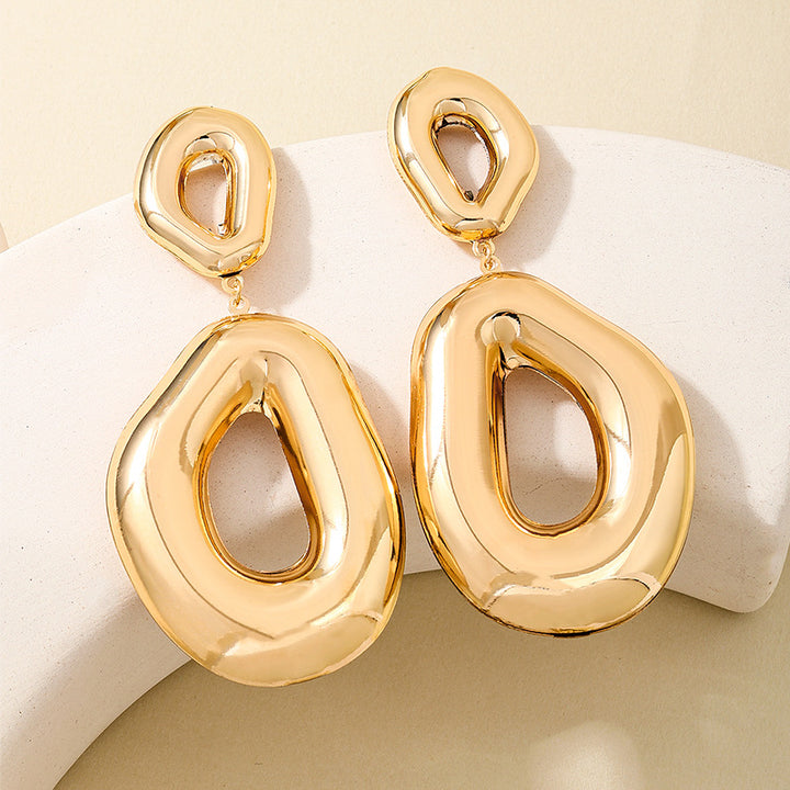 Bold molten drop earring with open center – Zindu