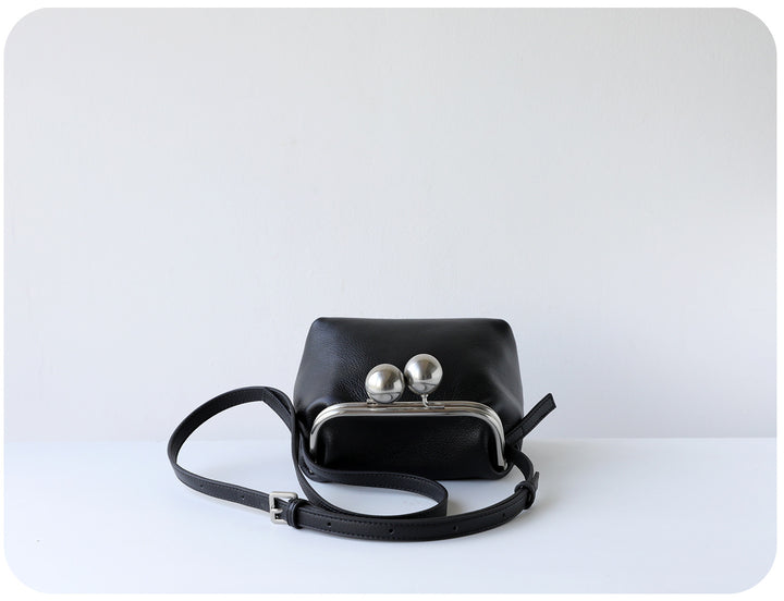 mini leather crossbody bag with metal frame clasp – YOUSF