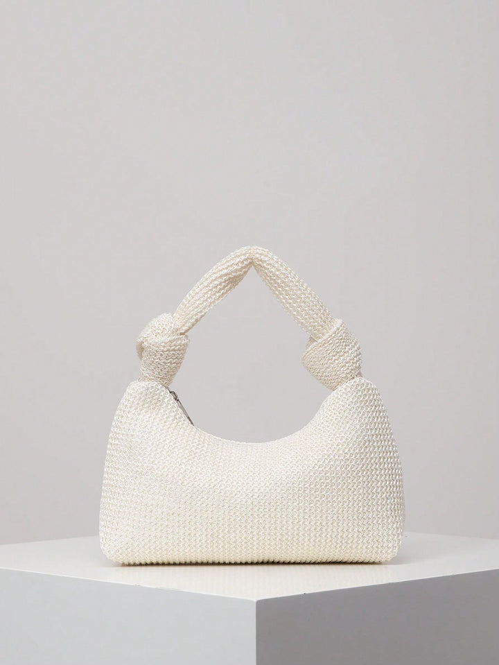 Knotted handle shoulder bag in woven cream raffia - Rutri