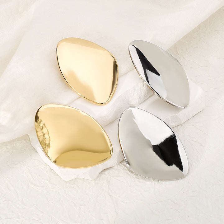 Asymmetric leaf-shaped metal earring with high polish finish – Elindu