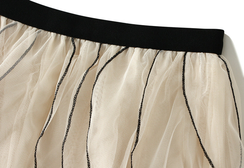 layered tulle skirt with contrast wave edging – SERENE