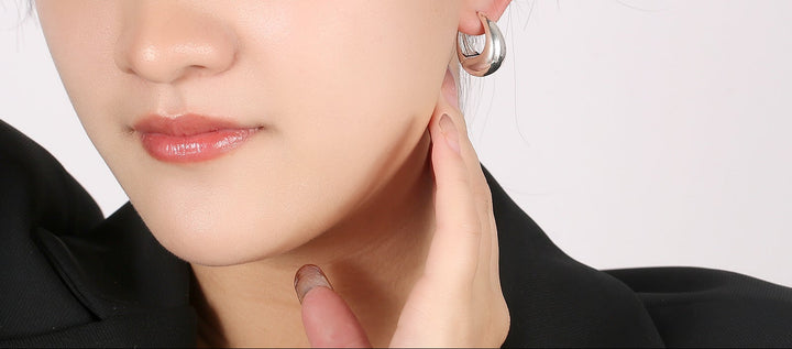 Boucles d'oreilles en forme de goutte en or et argent poli - Awama 