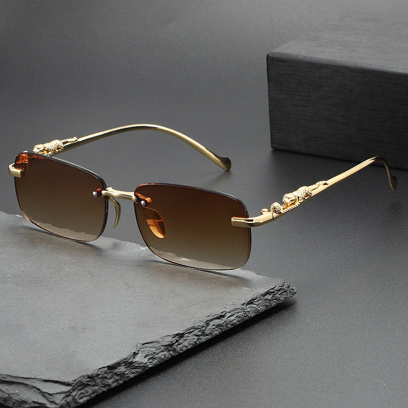 rectangular rimless sunglasses with gold panther arms – NOMR