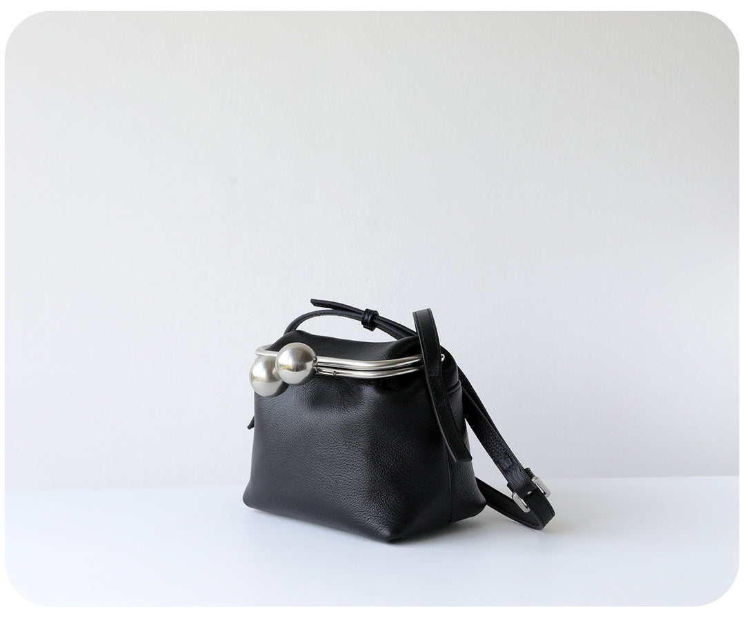 mini leather crossbody bag with metal frame clasp – YOUSF