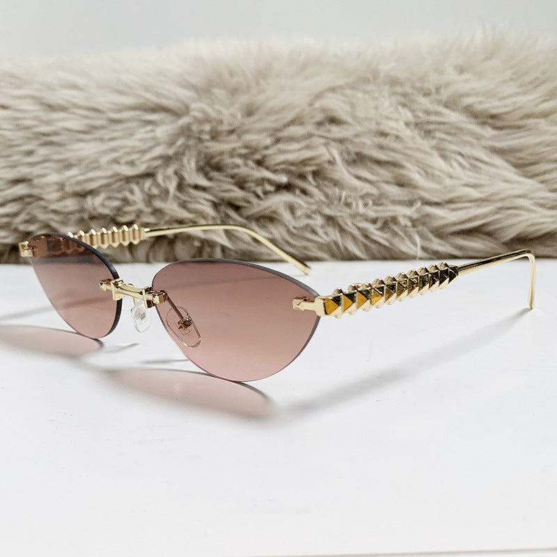rimless cat-eye sunglasses with gold studded temples – ASTRIDI
