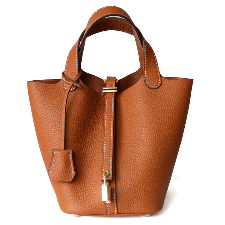 textured leather tote bag with lock detail – AURA