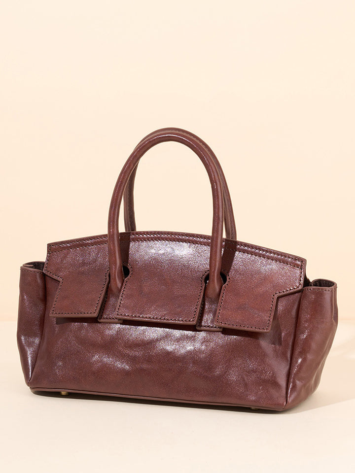 soft leather mini carryall with structured flap detail – CAMELIA
